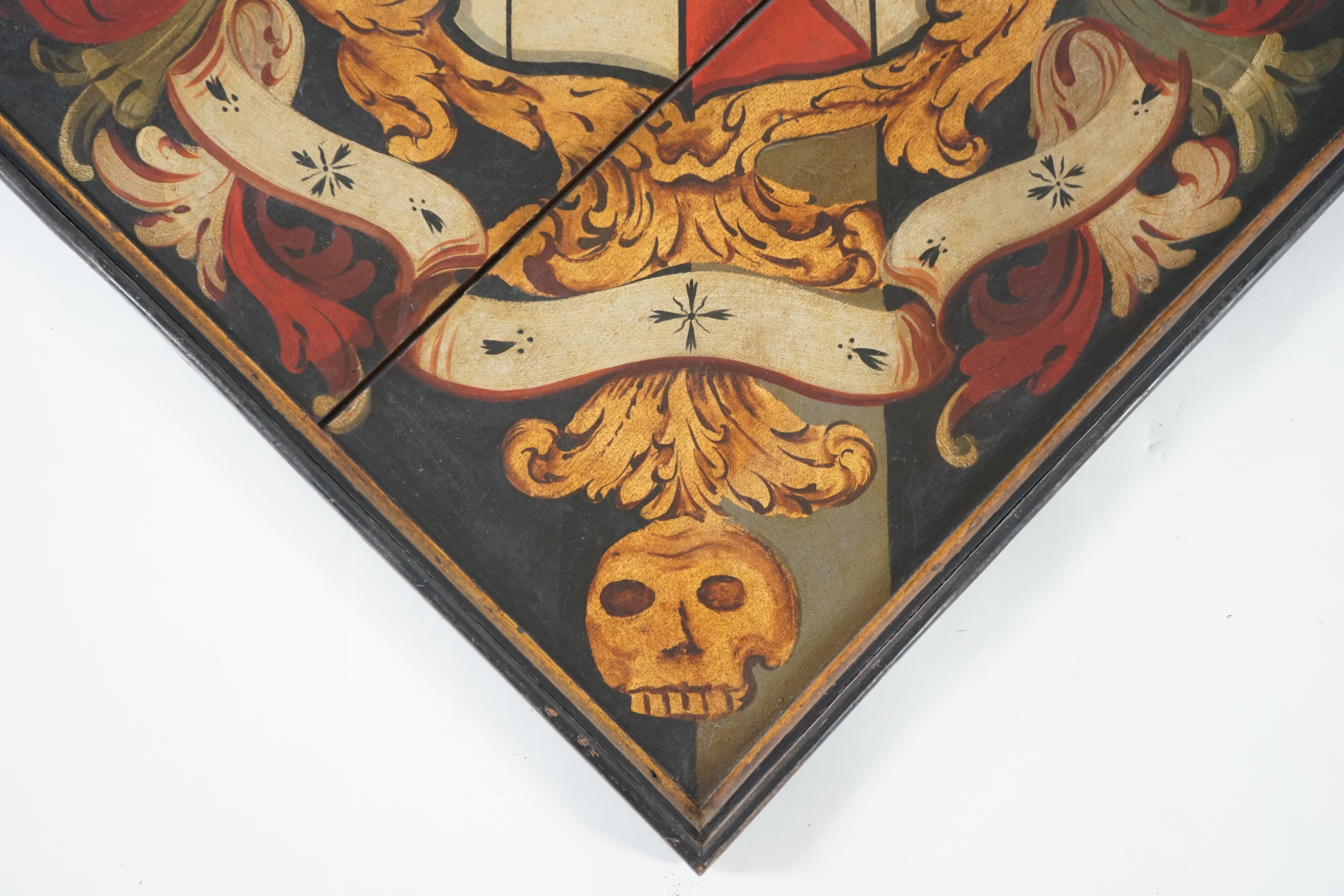 A late 18th / early 19th century oil on wooden panel hatchment
